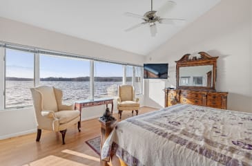 Explore waterfront bedroom views in our real estate listings, presented by Jason Anson, dedicated to helping buyers find their dream home.